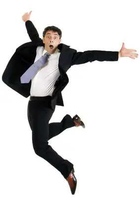 Agile businessman leaping in the air