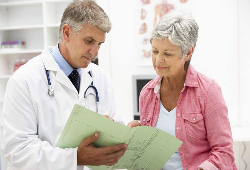 Doctor with female patient