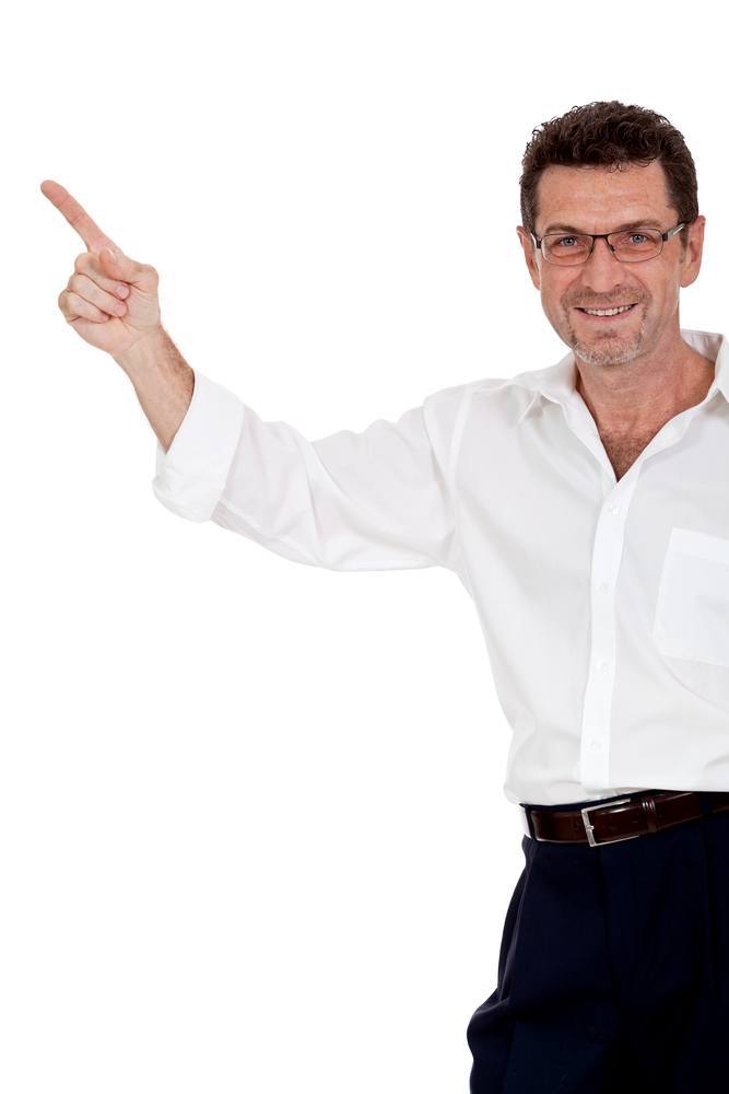 adult attractive smiling man pointing his finger on the copyspace