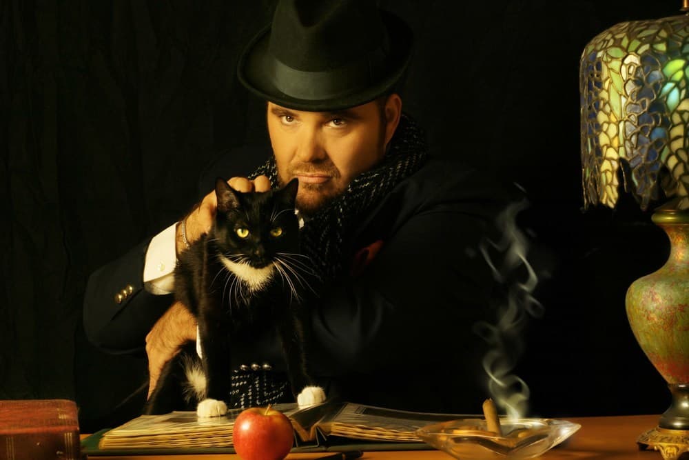 man with cat