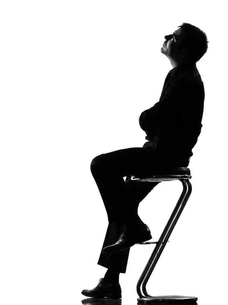 silhouette man thinking pensive full length looking up